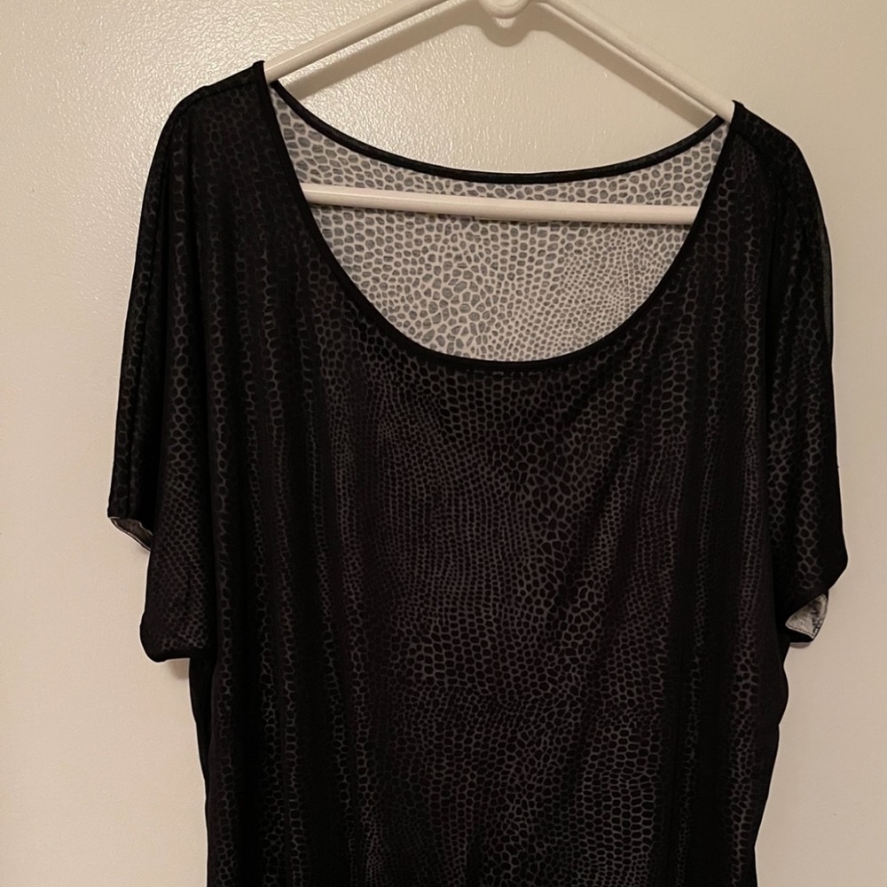 Reitmans. Gorgeous 🤩 animal-print top with sheer outer layer. Size 3X. $14.